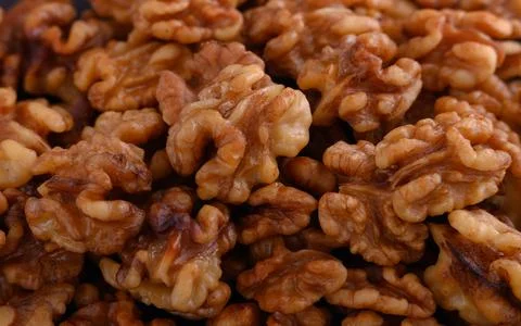 Peeled organic fresh walnuts pattern macro outlook Stock Photos