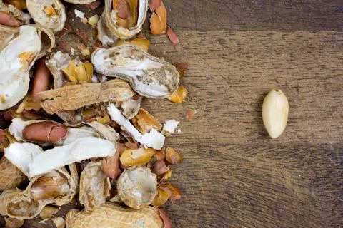 Peeled peanut, nutshells Stock Photos