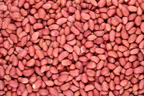 Peeled peanuts background Stock Photos