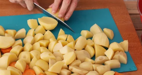 Peeled potato chopping Stock Footage 102140272