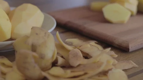 Peeled Potatoes On The Table Stock Footage 117704296