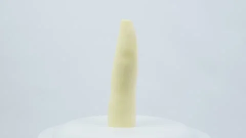 Peeled Raw Cassava Root Rotating on White Background Stock Footage 324914253