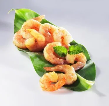 Peeled shrimp on a leaf Stock Photos