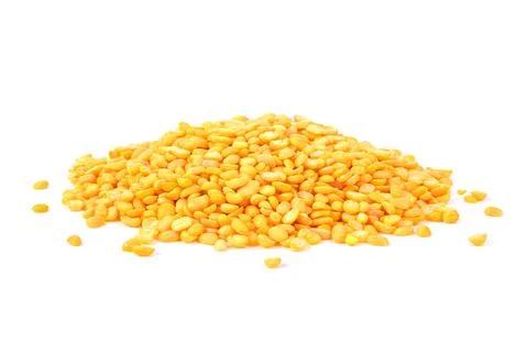 Peeled split mung bean isolated on white. 库存照片