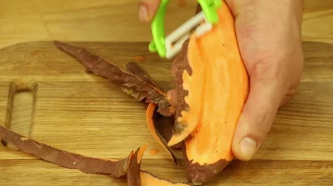 Peeled sweet potatoes Stock Footage 68784470