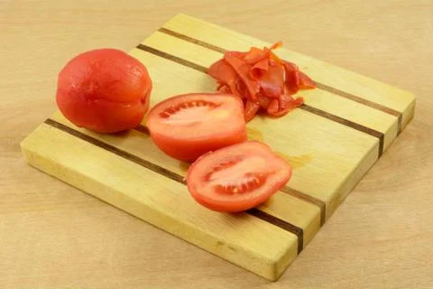 Peeled tomatoes Stock Photos