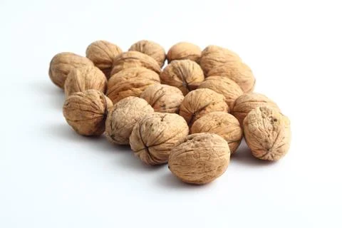 Peeled walnut closeup. Stock Photos