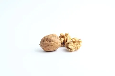 Peeled walnut closeup. Stock Photos