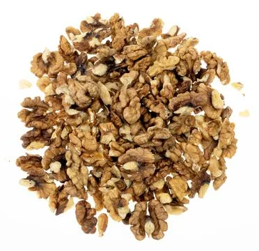 Peeled walnut kernels on a light background Stock Photos