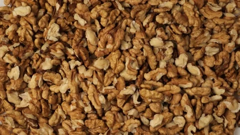 Peeled walnut kernels rotating Stock Footage 341281243