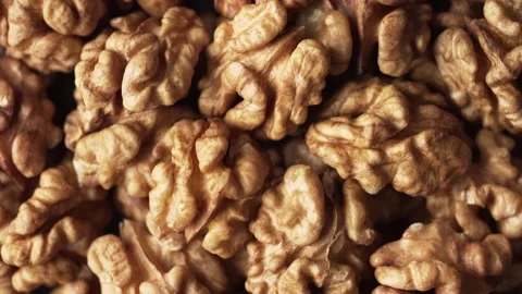 Peeled walnut, top view, rotate. Nutrient-rich foods. Stock Footage 143965442