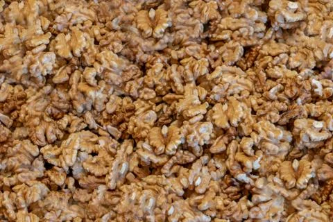 Peeled walnuts. Background. Texture. Stock Photos