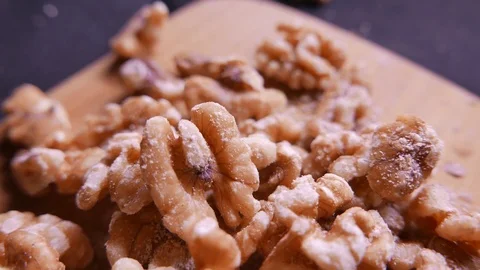 Peeled walnuts. Closeup 4K Stock Footage 73571506