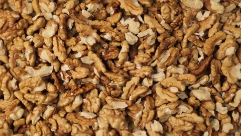 Peeled walnuts moving slowly in a dolly shot Stock Footage 344604762