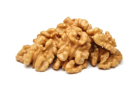 Peeled walnuts on white background Stock Photos