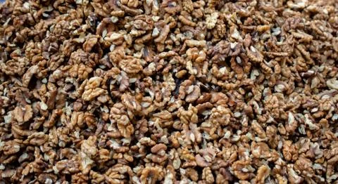 Peeled Walnuts without shell heap pattern as organic food background Stock Photos