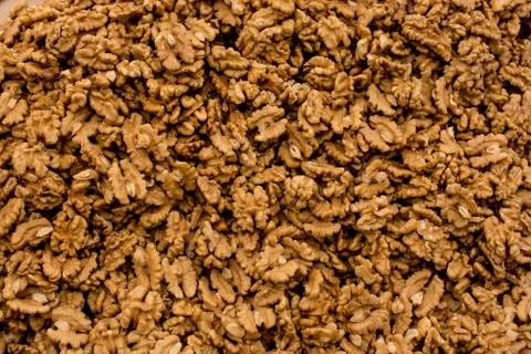 Peeled Walnuts without shell heap pattern as organic food background Stockfoto's