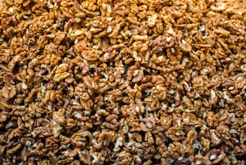 Peeled Walnuts without shell heap pattern as organic food background Stock Photos