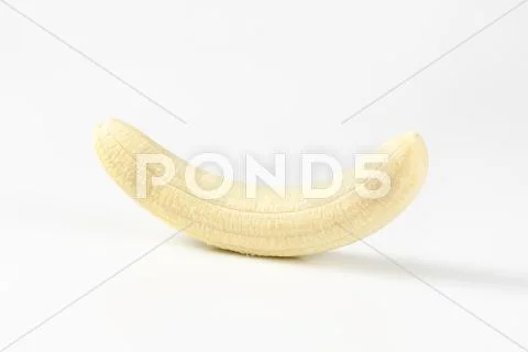 Peeled whole banana Stock Photos