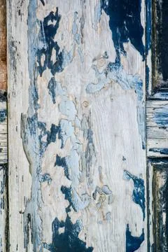 Peeling and battered paint on a old battered door Stock Photos
