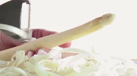 Peeling asparagus Stock Footage 24672339