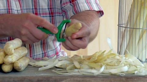 Peeling asparagus Stock Footage 75863382