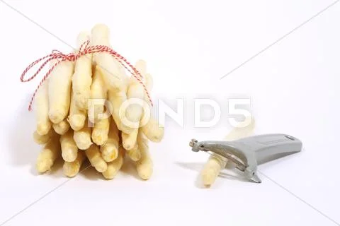Peeling asparagus Stock Photos