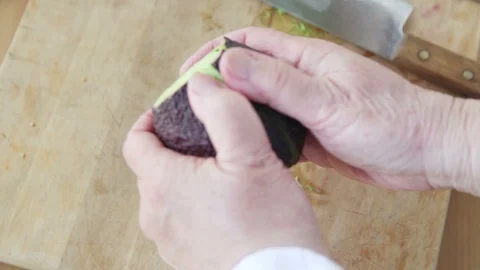 Peeling an avocado Stock Footage 98516356