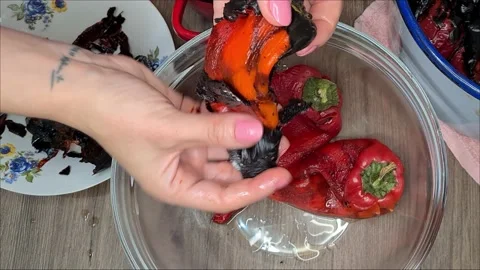 Peeling Baked Red Pepper Stock Footage 166794123