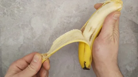 Peeling a banana Stock Footage 177595960