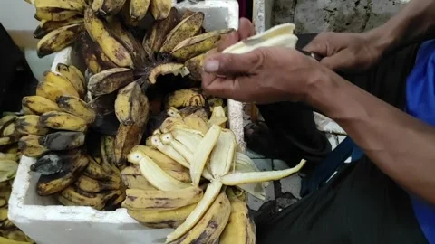 Peeling off banana Stock Footage 339260982