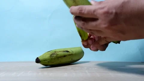Peeling bananas Stock Footage 229781406