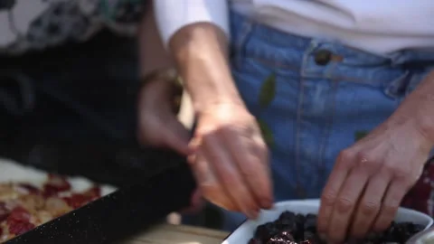 Peeling black olives Stock Footage 133749839