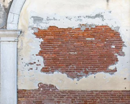 Peeling Off Bricks Peeling Off Facade at Brick Wall Building Ruin Copyrigh... Fotos de archivo