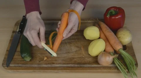 Peeling carrot Stock Footage 22099012