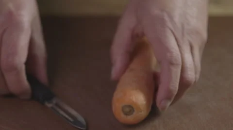 Peeling a carrot Stock Footage 64026302