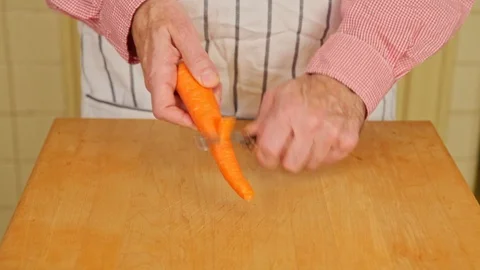 Peeling a Carrot Stock Footage 126655212