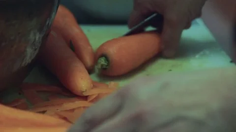 Peeling carrots Stock Footage 78017374