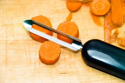 Peeling carrots Stock Photos