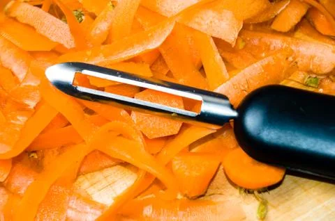 Peeling carrots Stock Photos