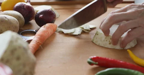 Peeling celery root slice, close up Stock Footage 146244030