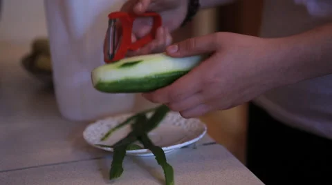 Peeling a cucumber Stock Footage 41684336