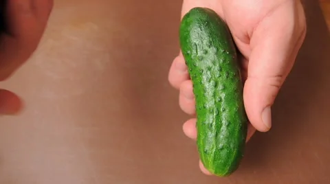 Peeling a cucumber Stock Footage 61784968