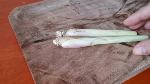 Peeling Dead Leaves of Stalk of Lemon Grass Stock Footage 231363638