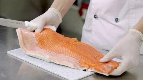 Peeling fish fillets with a knife Video stock 150253883
