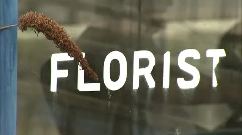 Peeling Florists Sign on Window Video stock 8907929