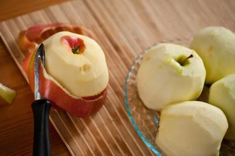 Peeling fresh red apple Stock Photos