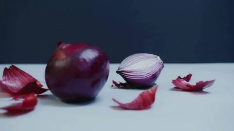 Peeling fresh shallots Stock Footage 243911012