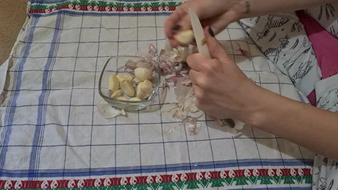 Peeling garlic Stock Footage 152410993