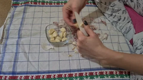 Peeling garlic Stock Footage 152411011